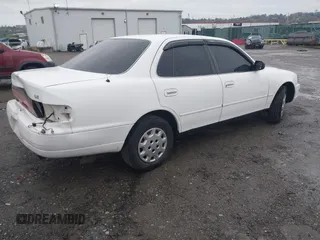 1994 Toyota Camry LE with VIN 4T1SK12E9RU848607, listed as a IAAI auction lot 41972535 with 152,468 mi miles. Bid and sale history available at carsss.com. Image 4.