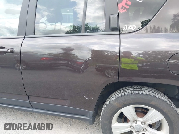 2014 Jeep Compass Latitude with VIN 1C4NJDEBXED622352, listed as a IAAI auction lot 42130403 with 149,024 mi miles. Bid and sale history available at carsss.com. Image 14.