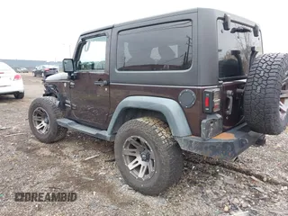 2013 Jeep Wrangler Sport with VIN 1C4AJWAG5DL679350, listed as a IAAI auction lot 40893582 with 61,191 mi miles and . Bid and sale history available at carsss.com. Image 3.
