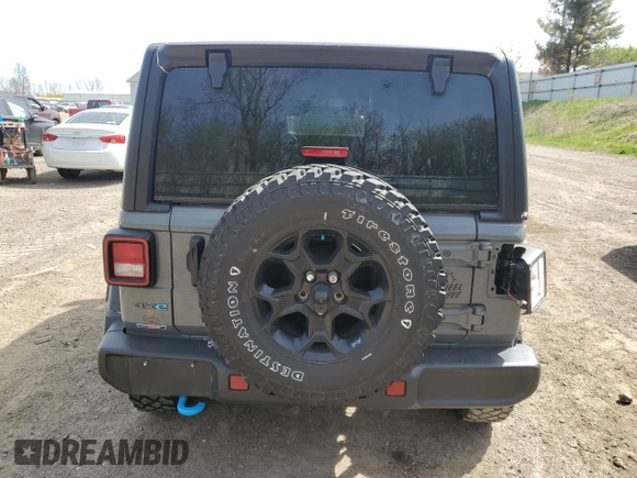 2023 Jeep Wrangler z VIN 1C4JJXN61PW623013, wystawiony jako Copart lot #54681425 z przebiegiem 26 574 mil mil oraz Czysty tytuł • Clean title. Historia ofert i sprzedaży dostępna na DreamBid. Obrazek 6.
