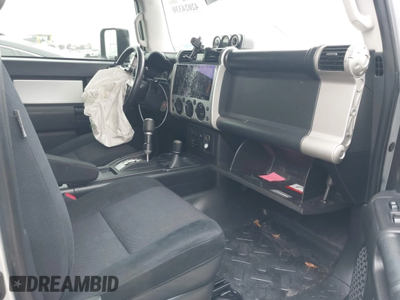 2007 Toyota FJ Cruiser with VIN JTEBU11F370036941, listed as a IAAI auction lot 42024330 with 164,703 mi miles. Bid and sale history available at carsss.com. Image 5.