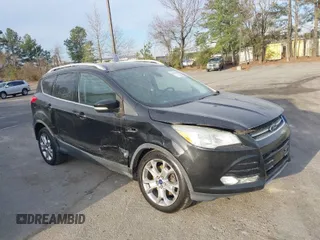 2015 Ford Escape Titanium with VIN 1FMCU0J98FUA19911, listed as a IAAI auction lot 41750596 with 106,706 mi miles. Bid and sale history available at carsss.com. Image 1.