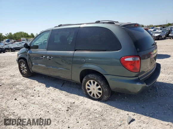 2003 Chrysler Town & Country LX with VIN 2C4GP44L33R162432, listed as a Copart auction lot 69942414 with 153,564 mi miles and Salvage Title. Bid and sale history available at DreamBid. Image 2.