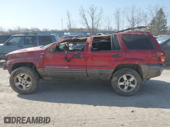 2004 Jeep Grand Cherokee Laredo z VIN 1J4GW48S34C289321, wystawiony jako IAAI lot #42062819 z przebiegiem Nie podano mil oraz . Historia ofert i sprzedaży dostępna na DreamBid. Obrazek 14.