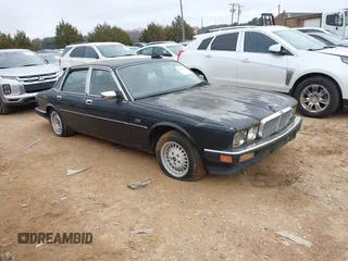 1989 Jaguar XJ with VIN SAJHY1545KC588624, listed as a IAAI auction lot 41406797 with Not provided miles and . Bid and sale history available at DreamBid. Image 1.