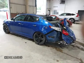 2014 Kia Optima SXL Turbo with VIN 5XXGR4A61EG256801, listed as a IAAI auction lot 42362910 with 216,480 mi miles and . Bid and sale history available at DreamBid. Image 3.