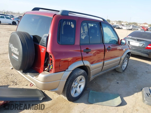 2002 Suzuki Grand Vitara JLX z VIN JS3TD62V824152943, wystawiony jako IAAI lot #41668395 z przebiegiem 104 191 mil mil oraz . Historia ofert i sprzedaży dostępna na DreamBid. Obrazek 4.