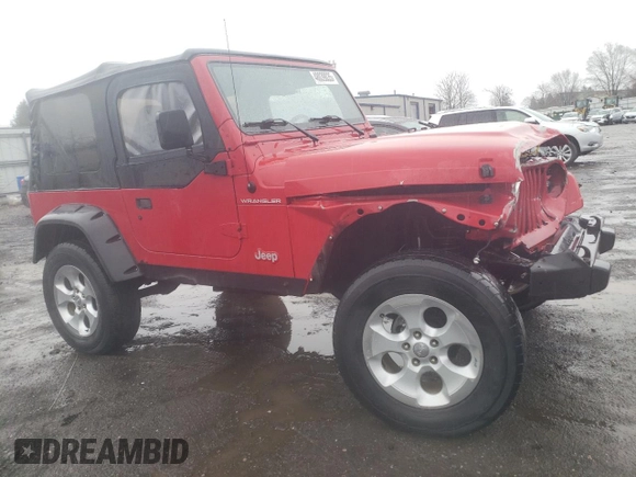 2002 Jeep Wrangler SE with VIN 1J4FA29P02P715013, listed as a Copart auction lot 48039035 with 193,583 mi miles and Salvage Title. Bid and sale history available at DreamBid. Image 4.