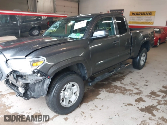 2020 Toyota Tacoma SR with VIN 3TYRX5GN5LT005461, listed as a IAAI auction lot 42020692 with 71,548 mi miles and . Bid and sale history available at DreamBid. Image 2.