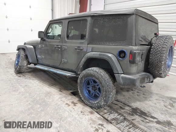 2020 Jeep Wrangler Unlimited Sport Altitude with VIN 1C4HJXDG7LW167909, listed as a IAAI auction lot 41413004 with 69,631 mi miles and . Bid and sale history available at DreamBid. Image 3.