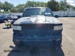 2000 GMC Denali z VIN 1GKEK13R4YR150964, wystawiony jako Copart lot #80484214 z przebiegiem 176 859 mil mil oraz Szkody całkowita. Historia ofert i sprzedaży dostępna na DreamBid. Obrazek 5.