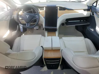 2019 Tesla Model S 100D with VIN 5YJSA1E42KF331240, listed as a Copart auction lot 54713975 with 43,940 mi miles and Salvage title. Bid and sale history available at DreamBid. Image 8.