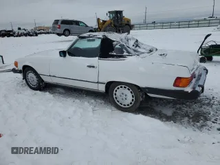 1986 Mercedes-Benz 560 SL with VIN WDBBA48D8GA042178, listed as a Copart auction lot 41809525 with 80,788 mi miles and Salvage Title. Bid and sale history available at DreamBid. Image 2.