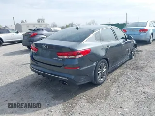 2020 Kia Optima LX with VIN 5XXGT4L3XLG399702, listed as a IAAI auction lot 42092023 with 70,861 mi miles and . Bid and sale history available at DreamBid. Image 4.