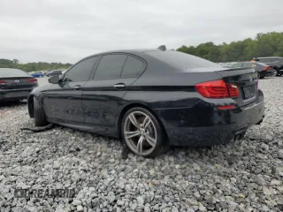 2013 BMW M5 with VIN WBSFV9C53DD096852, listed as a Copart auction lot 65917404 with 0 mi miles and Salvage Title. Bid and sale history available at carsss.com. Image 2.