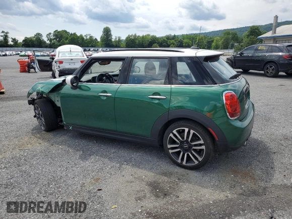2021 MINI Hardtop 4 Door Oxford Edition with VIN WMWXU7C0XM2P49113, listed as a Copart auction lot 61437805 with 40,399 mi miles and Salvage title. Bid and sale history available at DreamBid. Image 2.