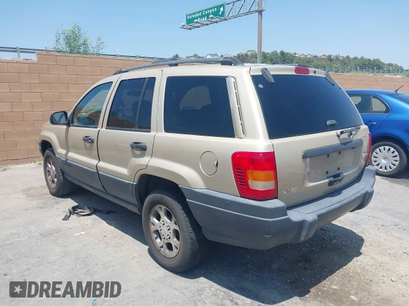 2001 Jeep Grand Cherokee Laredo with VIN 1J4GX48S01C606559, listed as a IAAI auction lot 42384286 with 149,146 mi miles and . Bid and sale history available at DreamBid. Image 3.