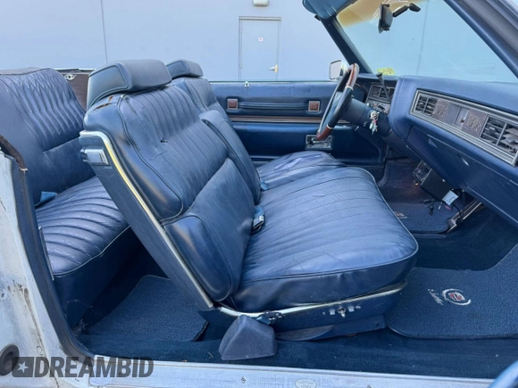 1973 Cadillac Eldorado z VIN 6L67S3Q410957, wystawiony jako Copart lot #64316435 z przebiegiem 74 584 mil mil oraz Czysty tytuł • Clean title. Historia ofert i sprzedaży dostępna na DreamBid. Obrazek 5.