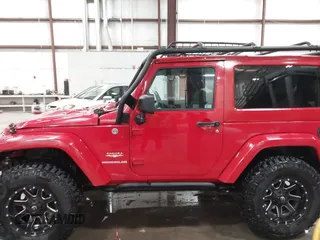 2011 Jeep Wrangler Sahara with VIN 1J4AA5D10BL593534, listed as a IAAI auction lot 41551416 with 101,716 mi miles and . Bid and sale history available at DreamBid. Image 14.
