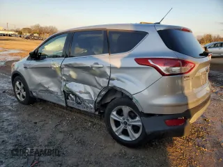2014 Ford Escape SE with VIN 1FMCU0GX1EUC11059, listed as a Copart auction lot 88116175 with 94,001 mi miles and Salvage Title. Bid and sale history available at carsss.com. Image 2.