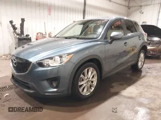2015 Mazda CX-5 Grand Touring with VIN JM3KE4DY7F0504398, listed as a IAAI auction lot 41698365 with 122,121 mi miles. Bid and sale history available at carsss.com. Image 17.