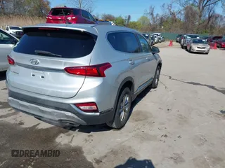 2019 Hyundai Santa Fe SE with VIN 5NMS23AD3KH030862, listed as a IAAI auction lot 41946700 with 198,264 mi miles. Bid and sale history available at carsss.com. Image 4.