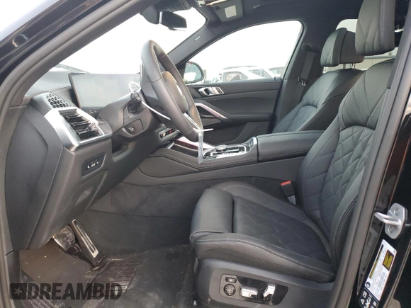 2025 BMW X6 xDrive40i with VIN 5UX33EX09S9Y26463, listed as a Copart auction lot 84269334 with 1,970 mi miles and Salvage Title. Bid and sale history available at carsss.com. Image 7.