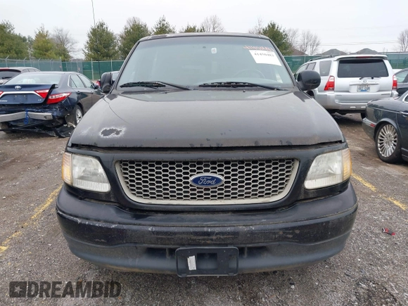 2001 Ford F-150 XL with VIN 2FTZF07211CA54107, listed as a IAAI auction lot 41450483 with 153,699 mi miles. Bid and sale history available at carsss.com. Image 6.