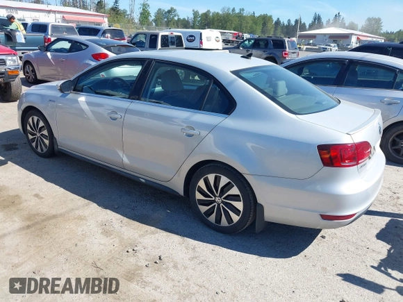 2013 Volkswagen Jetta Hybrid SE z VIN 3VW637AJ1DM303788, wystawiony jako IAAI lot #42205720 z przebiegiem 242 957 mil mil oraz . Historia ofert i sprzedaży dostępna na DreamBid. Obrazek 3.