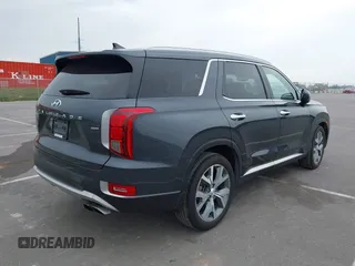 2021 Hyundai Palisade SEL with VIN KM8R4DHE0MU205427, listed as a IAAI auction lot 42436615 with 53,759 mi miles and . Bid and sale history available at DreamBid. Image 4.