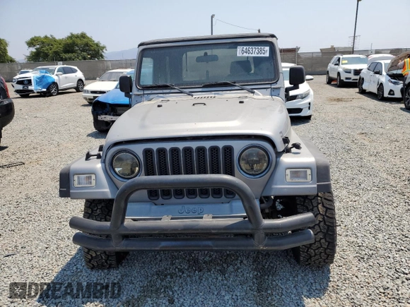 2001 Jeep Wrangler Sport с VIN 1J4FA49S41P353878, выставлен на аукционе Copart как лот 64637385 с пробегом 166 642 миль миль и Списание • Salvage title. История ставок и продаж доступна на DreamBid. Изображение 5.
