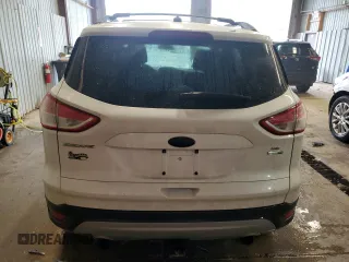 2013 Ford Escape SE z VIN 1FMCU9G96DUC02216, wystawiony jako Copart lot #63431115 z przebiegiem 186 614 mil mil oraz Szkoda całkowita • Salvage title. Historia ofert i sprzedaży dostępna na DreamBid. Obrazek 6.
