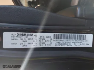 2014 Dodge Durango Limited with VIN 1C4RDJDG1EC973130, listed as a IAAI auction lot 41846596 with 166,182 mi miles. Bid and sale history available at carsss.com. Image 9.
