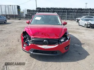 2016 Mazda CX-5 Grand Touring with VIN JM3KE4DY9G0850583, listed as a IAAI auction lot 42075545 with 92,789 mi miles and . Bid and sale history available at carsss.com. Image 6.