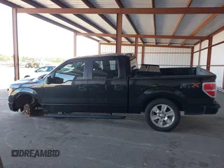 2014 Ford F-150 XL with VIN 1FTFW1CF9EKF87745, listed as a IAAI auction lot 42026883 with 221,307 mi miles. Bid and sale history available at carsss.com. Image 15.