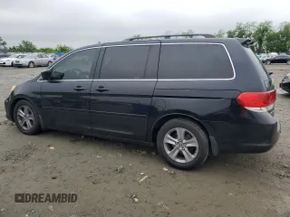 2008 Honda Odyssey Touring z VIN 5FNRL38968B014503, wystawiony jako Copart lot #56817625 z przebiegiem Nie podano mil oraz Szkoda całkowita • Salvage title. Historia ofert i sprzedaży dostępna na DreamBid. Obrazek 2.