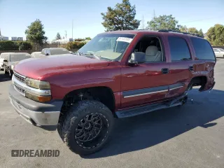 2003 Chevrolet Tahoe LS with VIN 1GNEC13T23J163652, listed as a Copart auction lot 64123395 with 229,396 mi miles and Salvage title. Bid and sale history available at DreamBid. Image 1.