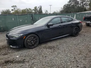 2024 BMW 8 Series M850i with VIN WBAGV8C00RCR84642, listed as a Copart auction lot 81367034 with 2,058 mi miles and Salvage Title. Bid and sale history available at carsss.com. Image 1.