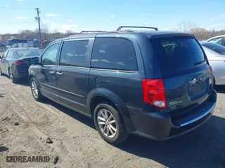 2014 Dodge Grand Caravan SXT with VIN 2C4RDGCGXER263302, listed as a IAAI auction lot 41893722 with 191,345 mi miles. Bid and sale history available at carsss.com. Image 3.