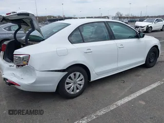 2014 Volkswagen Jetta Sedan S with VIN 3VW2K7AJ5EM329328, listed as a IAAI auction lot 41995084 with 72,409 mi miles. Bid and sale history available at carsss.com. Image 4.