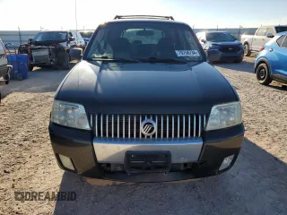 2005 Mercury Mariner Luxury z VIN 4M2CU56125DJ20570, wystawiony jako Copart lot #79758734 z przebiegiem 74 370 mil mil oraz Tytuł czysty. Historia ofert i sprzedaży dostępna na DreamBid. Obrazek 5.
