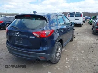 2015 Mazda CX-5 Sport with VIN JM3KE4BY3F0503011, listed as a IAAI auction lot 41973501 with 191,064 mi miles and . Bid and sale history available at carsss.com. Image 4.