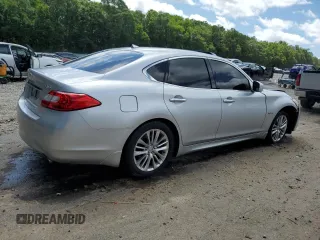 2012 Infiniti M Hybrid with VIN JN1EY1AP0CM910697, listed as a Copart auction lot 60821335 with 145,533 mi miles and Salvage title. Bid and sale history available at DreamBid. Image 3.