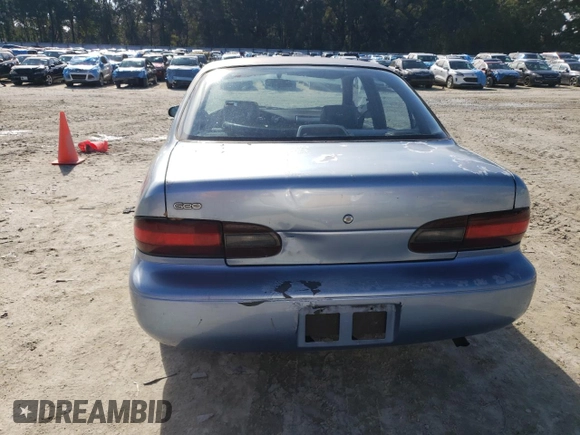 1996 Geo Prizm z VIN 1Y1SK526XTZ020379, wystawiony jako Copart lot #41657375 z przebiegiem 197 763 mil mil oraz Szkody całkowita. Historia ofert i sprzedaży dostępna na DreamBid. Obrazek 6.