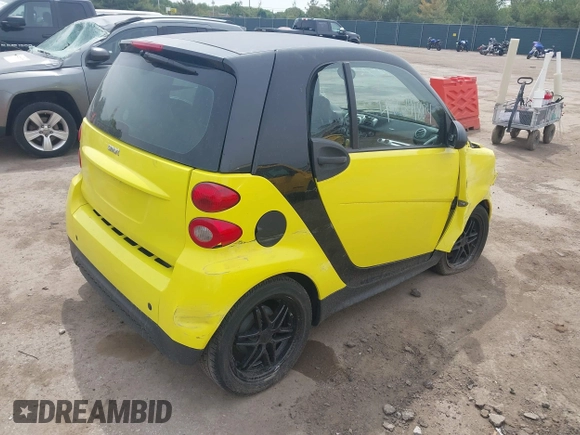 2013 Smart fortwo Pure with VIN WMEEJ3BA5DK663165, listed as a IAAI auction lot 42291804 with 105,074 mi miles and . Bid and sale history available at DreamBid. Image 4.