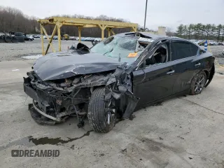 2015 Infiniti Q50 Premium z VIN JN1BV7AR3FM418217, wystawiony jako Copart lot #51313475 z przebiegiem 107 667 mil mil oraz Szkody całkowita. Historia ofert i sprzedaży dostępna na DreamBid. Obrazek 1.