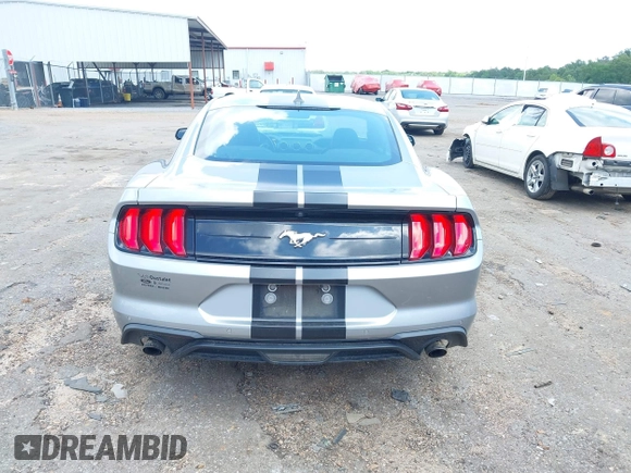 2021 Ford Mustang EcoBoost z VIN 1FA6P8TH1M5121107, wystawiony jako IAAI lot #42204097 z przebiegiem 51 542 mil mil oraz . Historia ofert i sprzedaży dostępna na DreamBid. Obrazek 16.