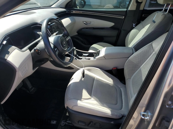 2022 Hyundai Tucson SEL z VIN 5NMJC3AE4NH132967, wystawiony jako Copart lot #52150335 z przebiegiem 70 693 mil mil oraz Szkoda całkowita • Salvage title. Historia ofert i sprzedaży dostępna na DreamBid. Obrazek 7.