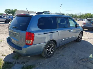 2014 Kia Sedona EX with VIN KNDMH4C70E6553732, listed as a IAAI auction lot 41812283 with 676,894 mi miles. Bid and sale history available at carsss.com. Image 4.