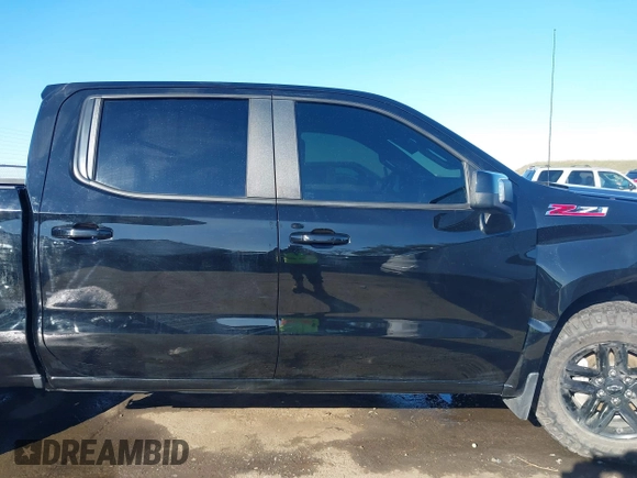 2021 Chevrolet Silverado 1500 LT Trail Boss with VIN 1GCPYFEL8MZ254411, listed as a IAAI auction lot 41313530 with 32,409 mi miles and . Bid and sale history available at DreamBid. Image 13.